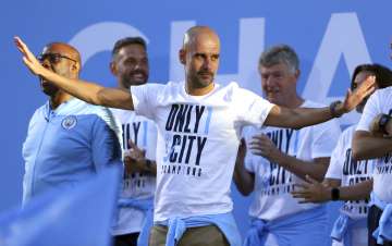 Pep Guardiola signs new Manchester City deal through 2021