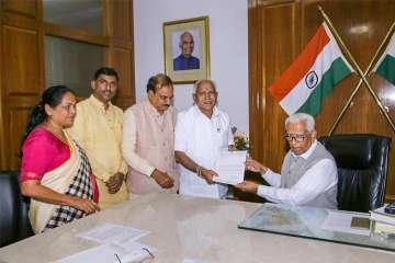 BS Yeddyurappa presenting his stake to power to Governor yesterday in Bengaluru