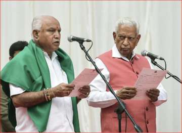 Karnataka Governor Vajubhai Vala administers oath to Bharatiya Janata Party (BJP) leader Yeddyurappa as new CM