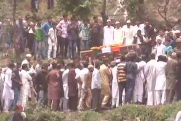Hundreds gathered to bid a final goodbye to their hero - Aurangzeb in his native village in Poonch, 