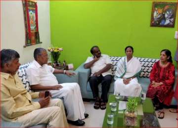 The four CMs during a meeting with wife of Delhi CM Arvind Kejriwal, Sunita, at her residence, in New Delhi on Saturday