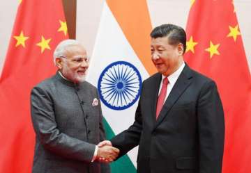 China on Monday, in a friendly gesture, proposed a trilateral summit to settle boundary disputes between India and Pakistan.