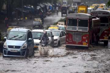 As the southwest monsoon picked up momentum in Mumbai, heavy showers lashed the city claiming four lives here and in adjoining Thane. The incessant downpour lashed Mumbai, Thane regions throughout Sunday night and continued this morning, triggering water-logging at several locations. It also slowed down the movement of suburban trains, causing further inconvenience to office-goers.  
 