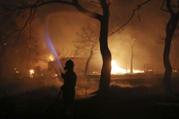 Wildfires across villages around Athens