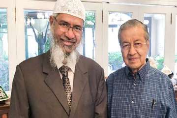 Controversial Islamic preacher Zakir Naik, who is wanted by Indian probe agencies for allegedly fuelling religious hatred through his speeches, met Malaysian Prime Minister Mahathir Mohamad on Saturday.