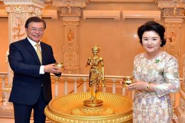 South Korean President Moon Jae-in with First Lady Kim Jung-sook visit Akshardham Temple, in New Delhi on Sunday.