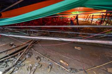 The scene after a makeshift tent collapsed during Prime Minister Narendra Modi's rally, in Midnapore district of West Bengal on Monday.