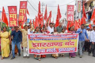 Communist Party of India (Marxist-Leninist) activists protest during 'Jharkhand Bandh' 