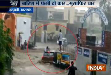 Watch: Miraculous save for 4 as rapid flood currents sweep away 3 vehicles in Uttarakhand's Haldwani