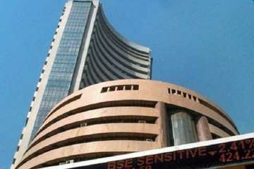 Sensex, Nifty settle at record closing levels