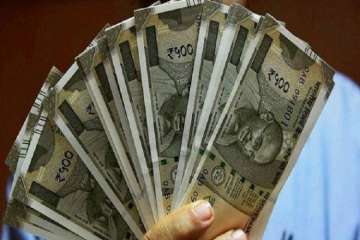 Rupee hits record low of 70.82 per dollar 
