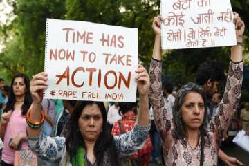 Women join a protest this week in New Delhi in support of victims following high-profile rape cases.