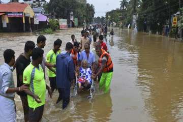  
An elderly woman is evacuated towards safer area in Thrissur. 
 