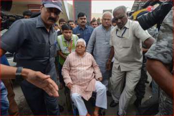 RJD chief Lalu Prasad Yadav arrives at Patna airport on Saturday