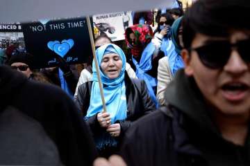 Uighurs and their supporters protest in front of the Permanent Mission of China to the United Nation