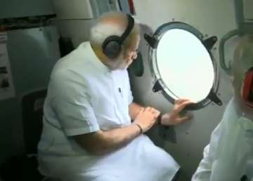 PM Modi conducts aerial survey