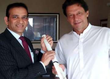 Ajay Bisaria with Imran Khan- File photo