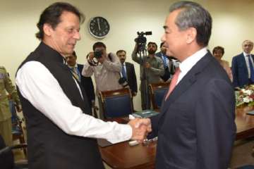 Wang, who arrived here on a three-day visit on Friday, met Khan in Islamabad with a high-level delegation.