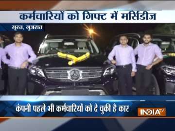 Surat based diamond trader gifts Mercedes to his employees