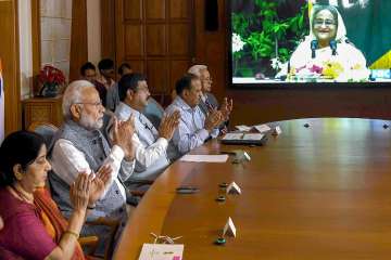 Prime Minister Narendra Modi and Prime Minister of Bangladesh Sheikh Hasina (on the screen) jointly unveil e-plaques for the ground-breaking ceremony of two projects - India-Bangladesh Friendship Pipeline & Dhaka-Tongi-Joydebpur Railway Project - via video conference, in New Delhi.