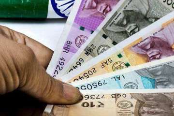 The rupee recovered from all-time low of 71 and strengthened by 23 paise to 70.77 against the US dollar.