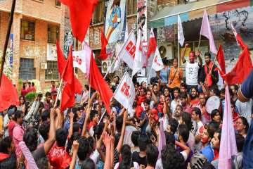 Members of Left Unity celebrate after their success in Jawaharlal Nehru University Student Union (JNUSU) elections.