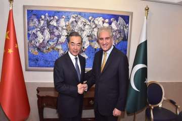 China's Foreign Minister Wang Yi with his Pak counterpart Shah Mahmood Qureshi.