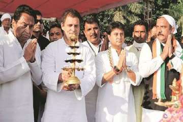 Rahul Gandhi, flanked by?PCC?chief?Kamal?Nath?and MP?Jyotiraditya?Scindia