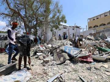 Suicide bombers walked into the two locations in the southwestern city of Baidoa and detonated their vests within minutes of each other, according to witnesses.