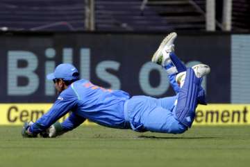 MS Dhoni takes a stunning catch after being dropped from T20s