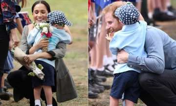 down syndrome kid hugs prince harry