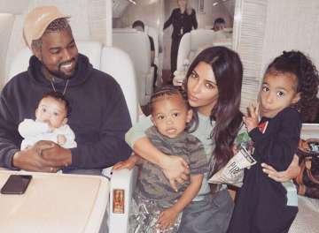 Kim Kardashian West says having three kids leads to wild household