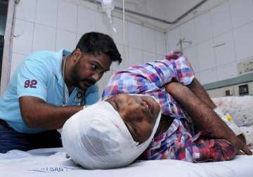 An injured person being treated at a hospital after Amritsar train tragedy