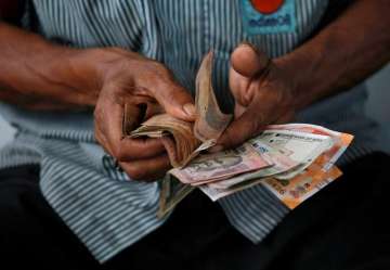 Rupee falls 24 paise, hits all-time low of 74.45 against US dollar.