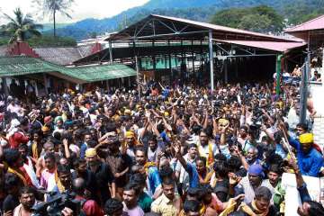 Sabarimala: Devotees protest as several female devotee arrive to offer prayers, at Sabarimala temple in the light of the recent verdict by Supreme Court allowing entry to women of all ages.