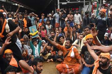 Protesters oppose the entry of women to the Sabarimala Temple, Kerala.