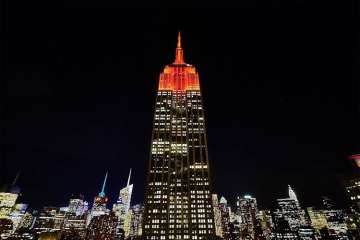 In a first, Empire State Building lit up in orange to celebrate Diwali