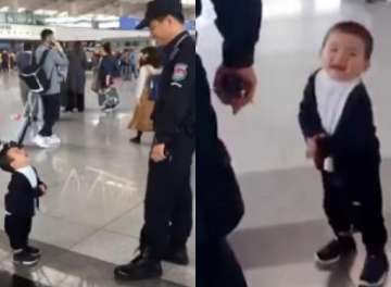 Toddler demanding hug from airport security guard is the cutest thing on internet today