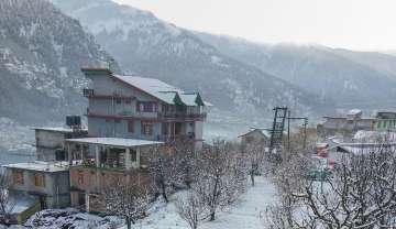  A view after fresh snowfall in Manali, Thursday