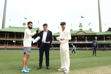 Virat Kohli slammed for wearing shorts at toss for warm-up match