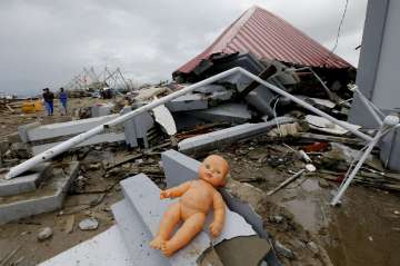 Indonesia tsunami leaves behind trail of destruction