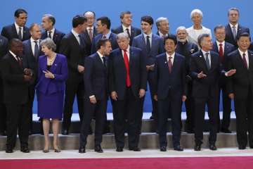 World leaders pose for a group photograph at the G20 summit.