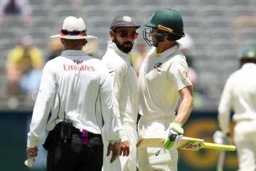 BCCI rubbishes reports of Virat Kohli sledging Tim Paine in Perth