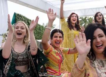 Parineeti Chopra shares happy picture with bride Priyanka Chopra