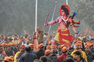  
 Vishwa Hindu Parishad’s (VHP) supporters gather around the installed cutout of Lord Ram during ‘Dharma Sabha’, in which thousands of people gathered at Ramlila Maidan to press for the construction of Ram Temple in Ayodhya, days before Parliament's winter session commences, in New Delhi, Sunday, Dec. 9, 2018.