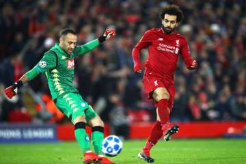 Champions League: Alisson, Salah heroic ensure Liverpool through in round of 16