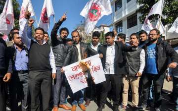 Guwahati: All Assam Students Union (AASU) activists hold placards as they raise slogans protesting against Citizenship (Amendment) Bill, 2016