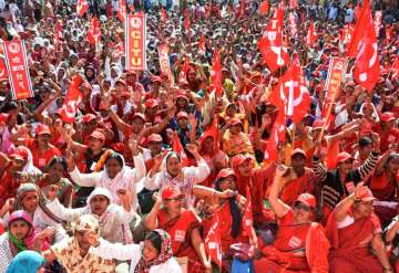 Activists under the banner of Centre of Indian Trade Unions (CITU) raise slogans during the 48-hours-long nationwide general strike called by central trade unions protesting against "anti-people" policies of the Center, in Nagpur