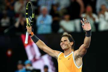 Australian Open: Rafael Nadal enters round three with easy win over Matthew Ebden