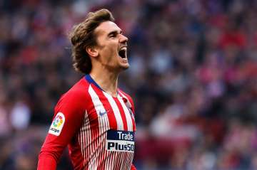 Atletico Madrid ease past Getafe to move closer to FC Barcelona